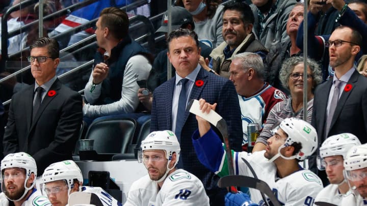Nov 11, 2021; Denver, Colorado, USA; Vancouver Canucks head coach Travis Green looks on from the bench in the third period against the Colorado Avalanche at Ball Arena. Mandatory Credit: Isaiah J. Downing-USA TODAY Sports