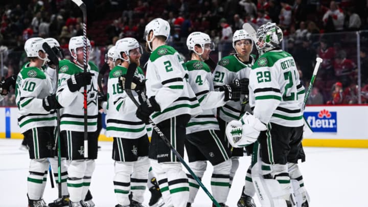 Oct 22, 2022; Montreal, Quebec, CAN; Dallas Stars players celebrate after defeating the Montreal Canadiens at Bell Centre. Mandatory Credit: David Kirouac-USA TODAY Sports