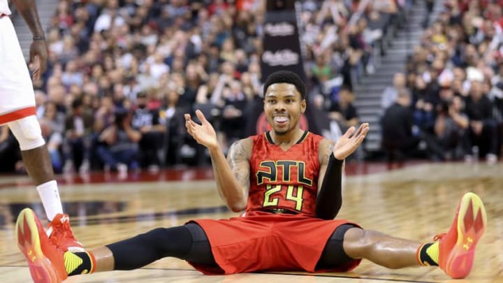 Dec 3, 2016; Toronto, Ontario, CAN; Kent Bazemore #24 of the Atlanta Hawks reacts after drawing a charging foul against the Toronto Raptors in the second quarter at Air Canada Centre. Mandatory Credit: Kevin Sousa-USA TODAY Sports