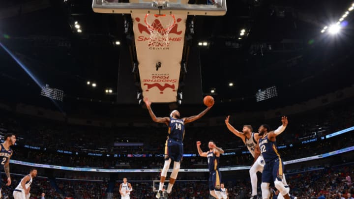 NEW ORLEANS, LA - OCTOBER 25: Brandon Ingram #14 of the New Orleans Pelicans grabs the rebound against the Dallas Mavericks on October 25, 2019 at the Smoothie King Center in New Orleans, Louisiana. NOTE TO USER: User expressly acknowledges and agrees that, by downloading and or using this Photograph, user is consenting to the terms and conditions of the Getty Images License Agreement. Mandatory Copyright Notice: Copyright 2019 NBAE (Photo by Jesse D. Garrabrant/NBAE via Getty Images)