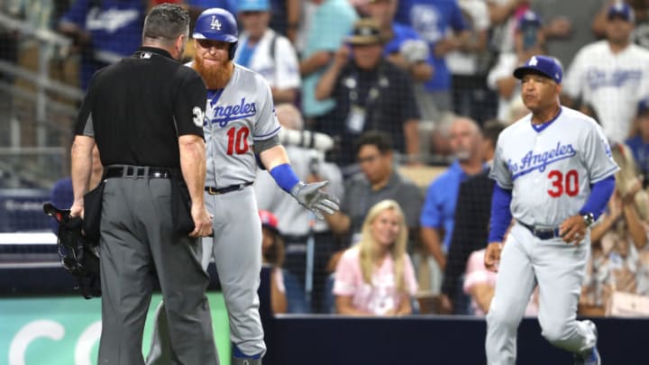 SAN DIEGO, CALIFORNIA - AUGUST 26: Manager Dave Roberts and Justin Turner #10 of the Los Angeles Dodgers argues with umpire Rob Drake #30 after striking out while looking to end the game against the San Diego Padres at PETCO Park on August 26, 2019 in San Diego, California. The San Diego Padres defeated the Los Angeles Dodgers 4-3. (Photo by Sean M. Haffey/Getty Images)