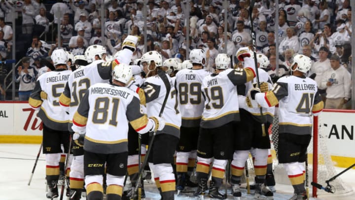 WINNIPEG, MB - MAY 20: Vegas Golden Knights players celebrate on the ice following a 2-1 victory over the Winnipeg Jets in Game Five of the Western Conference Final during the 2018 NHL Stanley Cup Playoffs at the Bell MTS Place on May 20, 2018 in Winnipeg, Manitoba, Canada. The Knights win the series 4-1. (Photo by Jonathan Kozub/NHLI via Getty Images)