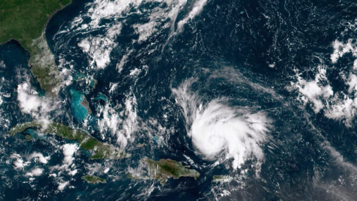 ATLANTIC OCEAN - AUGUST 29: In this NOAA GOES-East satellite image, Hurricane Dorian leaves the Caribbean Sea and tracks towards the Florida coast taken at 14:20 UTC August 29, 2019 in the Atlantic Ocean. According to the National Hurricane Center Dorian is predicted to hit Florida and the northern Bahamas as a Category 3 storm, bringing heavy rains and sustained winds of 125 mph.