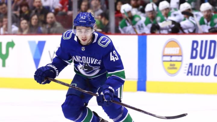 VANCOUVER, BC - MARCH 30: Quinn Hughes #43 of the Vancouver Canucks skates up ice during their NHL game against the Dallas Stars at Rogers Arena March 30, 2019 in Vancouver, British Columbia, Canada. (Photo by Jeff Vinnick/NHLI via Getty Images)"n