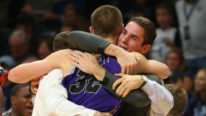 VILLANOVA, PA - NOVEMBER 17: Matt Rafferty #32 of the Furman Paladins hugs injured teammate Andrew Brown, right, after defeating the Villanova Wildcats 76-68 in overtime at Finneran Pavilion on November 17, 2018 in Villanova, Pennsylvania. (Photo by Rich Schultz/Getty Images)