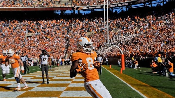 Nov 10, 2012; Knoxville, TN, USA; Tennessee Volunteers wide receiver Cordarrelle Patterson (84) scores a touchdown against the Missouri Tigers during the first half at Neyland Stadium. Mandatory Credit: Jim Brown-USA TODAY Sports