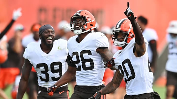 Aug 19, 2021; Berea, OH, USA; Cleveland Browns cornerback Greg Newsome II (20) celebrates with safety Richard LeCounte III (39) and cornerback Greedy Williams (26) after intercepting a pass during a joint practice with the New York Giants at CrossCountry Mortgage Campus. Mandatory Credit: Ken Blaze-USA TODAY Sports