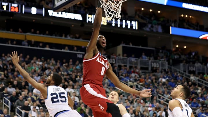 PITTSBURGH, PA – MARCH 17: Donta Hall #0 of the Alabama Crimson Tide dunks the ball against Mikal Bridges #25 of the Villanova Wildcats during the first half in the second round of the 2018 NCAA Men’s Basketball Tournament at PPG PAINTS Arena on March 17, 2018 in Pittsburgh, Pennsylvania. (Photo by Rob Carr/Getty Images)