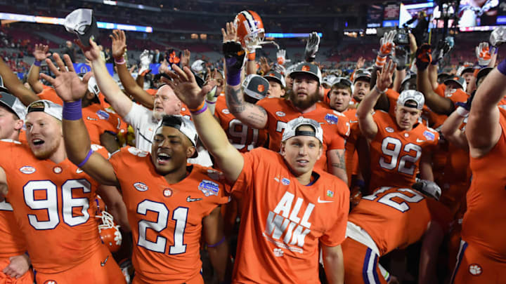 GLENDALE, AZ - DECEMBER 31: Clemson Tigers players celebrate after defeating the Ohio State Buckeyes 31-0 to win the 2016 PlayStation Fiesta Bowl at University of Phoenix Stadium on December 31, 2016 in Glendale, Arizona. (Photo by Norm Hall/Getty Images)