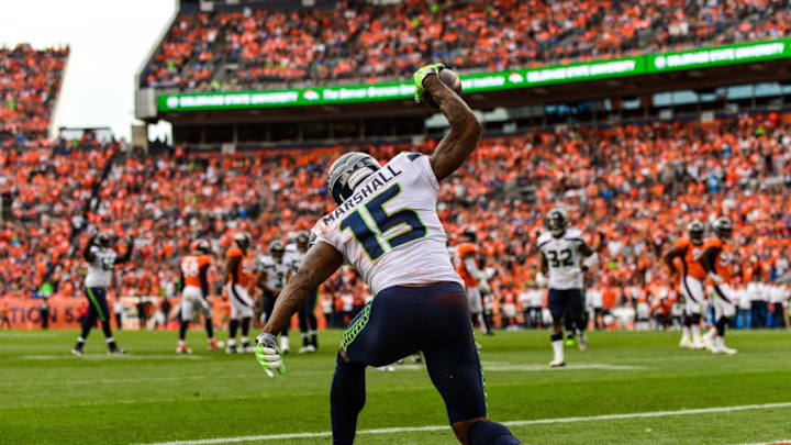 DENVER, CO - SEPTEMBER 9: Wide receiver Brandon Marshall #15 of the Seattle Seahawks celebrates after scoring a touchdown against the Denver Broncos in the third quarter of a game at Broncos Stadium at Mile High on September 9, 2018 in Denver, Colorado. (Photo by Dustin Bradford/Getty Images)