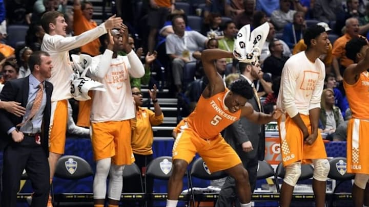 Mar 10, 2016; Nashville, TN, USA; Tennessee Volunteers players celebrate on the bench in the second half against the Vanderbilt Commodores during the SEC basketball tournament at Bridgestone Arena. Mandatory Credit: George Walker IV/The Tennessean via USA TODAY NETWORK
