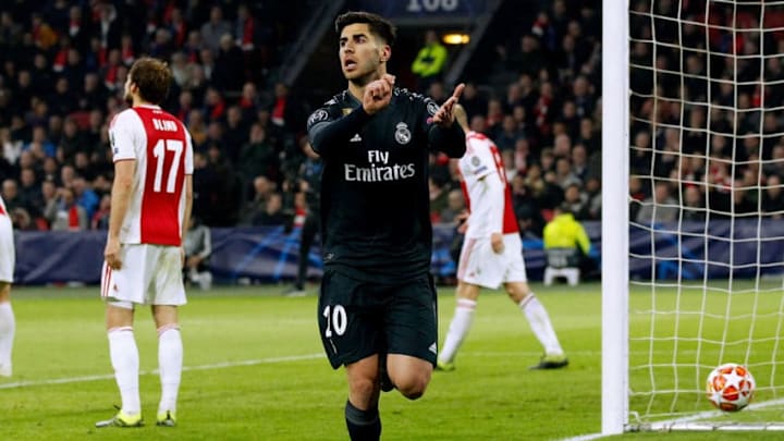 AMSTERDAM, NETHERLANDS – FEBRUARY 13: Marco Asensio of Real Madrid celebrates 2-1 during the UEFA Champions League match between Ajax v Real Madrid at the Johan Cruijff Arena on February 13, 2019 in Amsterdam Netherlands (Photo by David S. Bustamante/Soccrates/Getty Images)