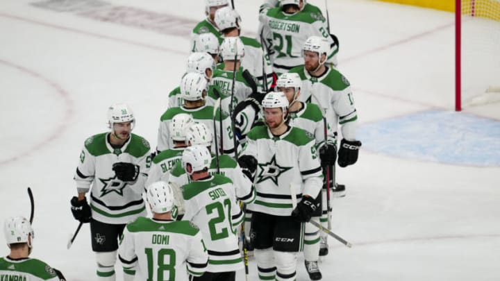 May 27, 2023; Las Vegas, Nevada, USA; The Dallas Stars celebrate on the ice after the Stars victory over the Vegas Golden Knights in game five of the Western Conference Finals of the 2023 Stanley Cup Playoffs at T-Mobile Arena. Mandatory Credit: Stephen R. Sylvanie-USA TODAY Sports