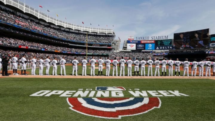 NEW YORK, NY - MARCH 28: (NEW YORK DAILIES OUT) The New York Yankees stand for the national anthem on Opening Day against the Baltimore Orioles at Yankee Stadium on March 28, 2019 in the Bronx borough of New York City. The Yankees defeated the Orioles 7-2. (Photo by Jim McIsaac/Getty Images)