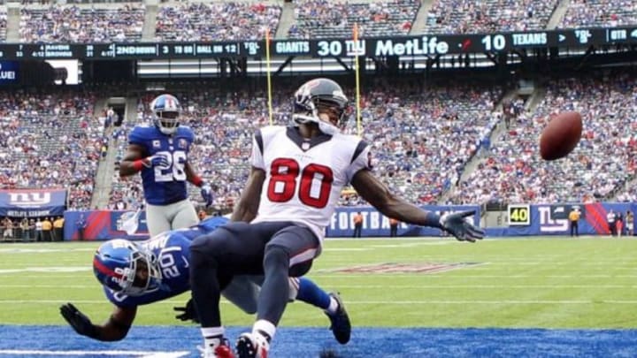 Sep 21, 2014; East Rutherford, NJ, USA; New York Giants cornerback Prince Amukamara (20) commits pass interference on a pass intended for Houston Texans wide receiver Andre Johnson (80) during the fourth quarter at MetLife Stadium. Mandatory Credit: Brad Penner-USA TODAY Sports
