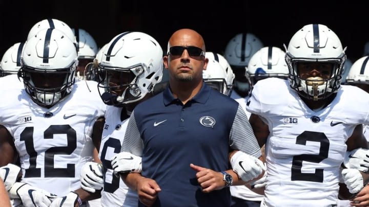Sep 10, 2016; Pittsburgh, PA, USA; Penn State Nittany Lions head coach James Franklin (C) leads the team onto the field to play the Pittsburgh Panthers at Heinz Field. Mandatory Credit: Charles LeClaire-USA TODAY Sports