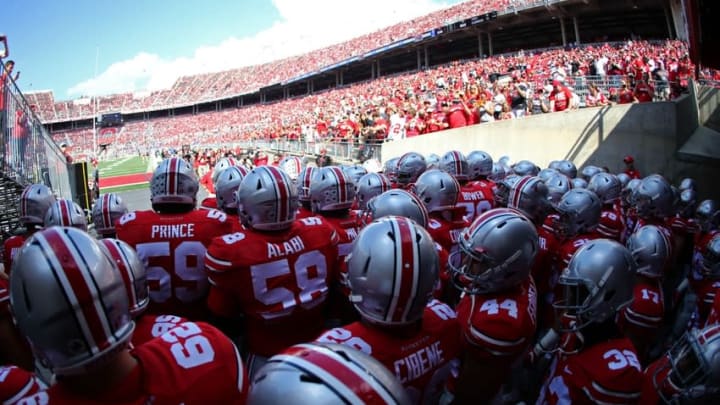 Sep 10, 2016; Columbus, OH, USA; Ohio State Buckeyes players prepare to take the field during warmups prior to the game against the Tulsa Golden Hurricane at Ohio Stadium. Mandatory Credit: Aaron Doster-USA TODAY Sports