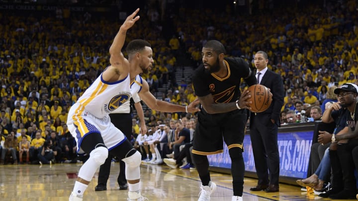Jun 4, 2017; Oakland, CA, USA; Cleveland Cavaliers guard Kyrie Irving (2) is defended by Golden State Warriors guard Stephen Curry (30) during the first half in game two of the 2017 NBA Finals at Oracle Arena. Mandatory Credit: Kyle Terada-USA TODAY Sports