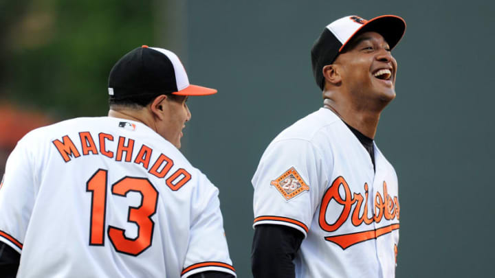BALTIMORE, MD - AUGUST 22: Jonathan Schoop #6 and Manny Machado #13 of the Baltimore Orioles talk before the start of the game against the Oakland Athletics at Oriole Park at Camden Yards on August 22, 2017 in Baltimore, Maryland. (Photo by Greg Fiume/Getty Images)