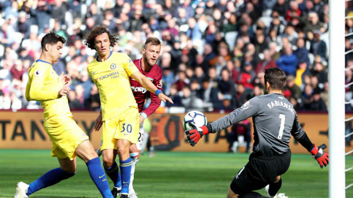 LONDON, ENGLAND - SEPTEMBER 23: Lukasz Fabianski of West Ham United saves a shot from Alvaro Morata of Chelsea during the Premier League match between West Ham United and Chelsea FC at London Stadium on September 23, 2018 in London, United Kingdom. (Photo by Dan Istitene/Getty Images)