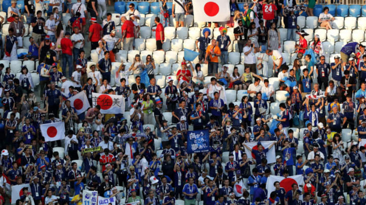 VOLGOGRAD, RUSSIA - JUNE 28: Japan fans celebrate following the 2018 FIFA World Cup Russia group H match between Japan and Poland at Volgograd Arena on June 28, 2018 in Volgograd, Russia. (Photo by Richard Heathcote/Getty Images)