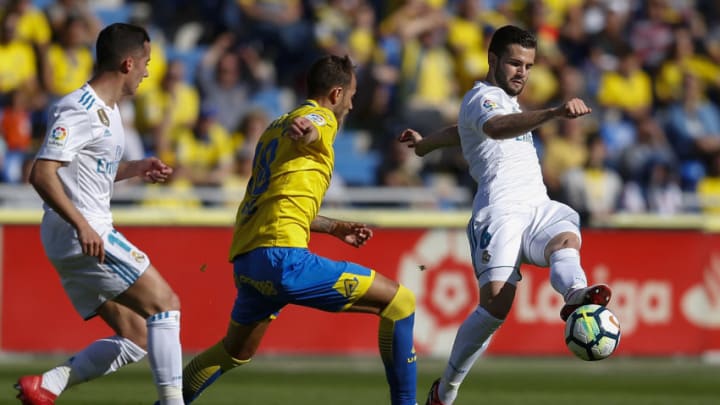 LAS PALMAS, SPAIN - MARCH 31: Nacho Fernandez of Real Madrid is challenged by Javi Castellano of UD Las Palmas during the La Liga match between UD Las Palmas and Real Madrid at the Gran Canaria stadium on March 31, 2018 in Las Palmas, Spain. (Photo by Angel Martinez/Real Madrid via Getty Images)