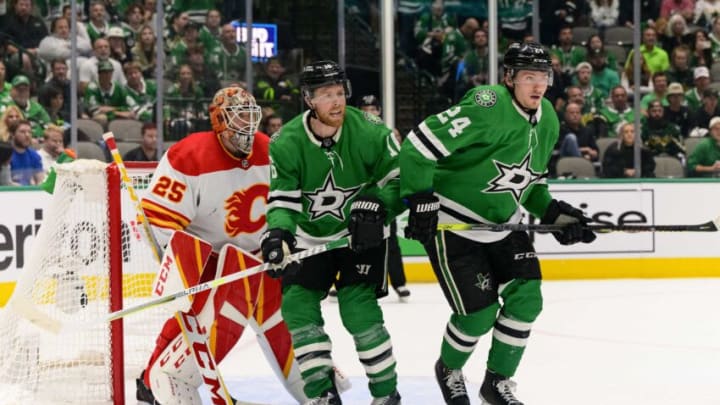 May 9, 2022; Dallas, Texas, USA; Dallas Stars center Joe Pavelski (16) and center Roope Hintz (24) screen Calgary Flames goaltender Jacob Markstrom (25) during the third period in game four of the first round of the 2022 Stanley Cup Playoffs at American Airlines Center. Mandatory Credit: Jerome Miron-USA TODAY Sports