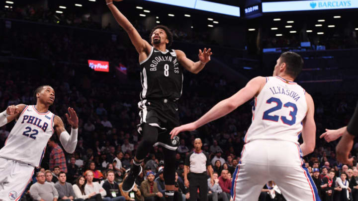 NEW YORK, NY - MARCH 11: Spencer Dinwiddie #8 of the Brooklyn Nets lays up a shot against Ersan Ilyasova #23 of the Philadelphia 76ers during the game at Barclays Center on March 11, 2018 in the Brooklyn borough of New York City. NOTE TO USER: User expressly acknowledges and agrees that, by downloading and or using this photograph, User is consenting to the terms and conditions of the Getty Images License Agreement. (Photo by Matteo Marchi/Getty Images) *** Local Caption *** Spencer Dinwiddie; Ersan Ilyasova