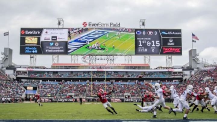 Jan 2, 2016; Jacksonville, FL, USA; Penn State Nittany Lions quarterback Christian Hackenberg (14) throws a pass during the second quarter against the Georgia Bulldogs at EverBank Field. Mandatory Credit: Logan Bowles-USA TODAY Sports