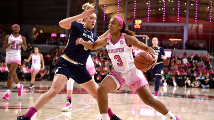 RALEIGH, NC – FEBRUARY 18: Kai Crutchfield #3 of the North Carolina State Wolfpack moves the ball against Marina Mabrey #3 of the Notre Dame Fighting Irish in the first half at Reynolds Coliseum on February 18, 2019 in Raleigh, North Carolina. (Photo by Lance King/Getty Images)