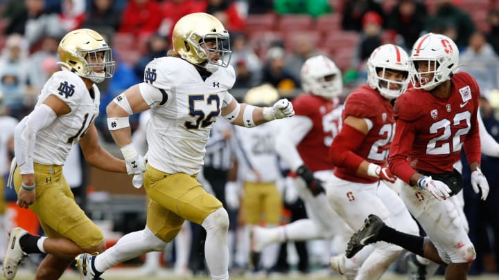 Nov 30, 2019; Stanford, CA, USA; Notre Dame Fighting Irish linebacker Bo Bauer (52) during a punt in the second quarter against the Stanford Cardinal at Stanford Stadium. Mandatory Credit: Darren Yamashita-USA TODAY Sports