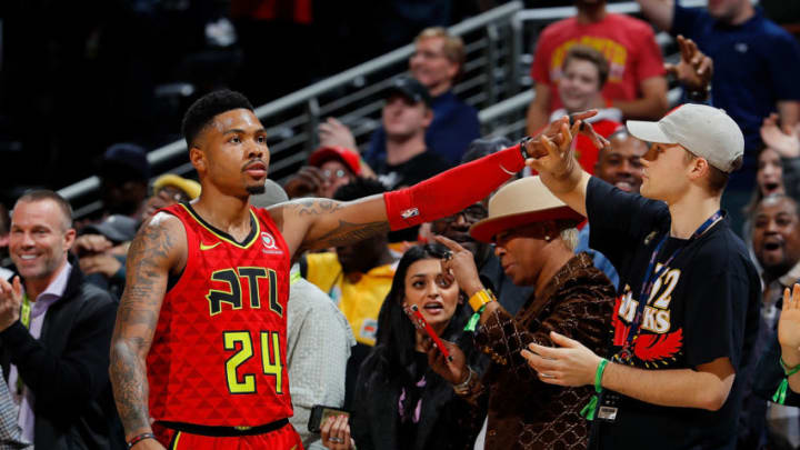 ATLANTA, GA - JANUARY 29: Kent Bazemore #24 of the Atlanta Hawks celebrates with fans in the final seconds of their 105-100 win over the Minnesota Timberwolves at Philips Arena on January 29, 2018 in Atlanta, Georgia. NOTE TO USER: User expressly acknowledges and agrees that, by downloading and or using this photograph, User is consenting to the terms and conditions of the Getty Images License Agreement. (Photo by Kevin C. Cox/Getty Images)