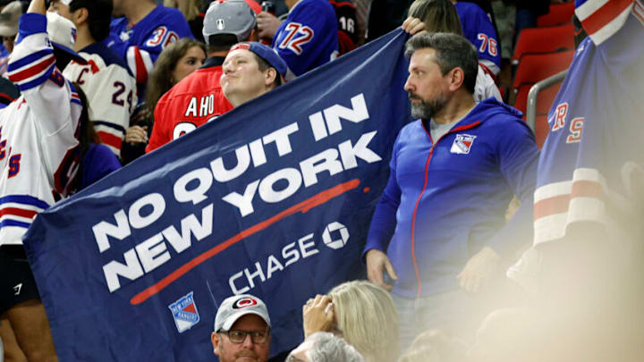 RALEIGH, NORTH CAROLINA - MAY 30: New York Rangers fans cheer during the third period in Game Seven of the Second Round of the 2022 Stanley Cup Playoffs against the Carolina Hurricanes at PNC Arena on May 30, 2022 in Raleigh, North Carolina. (Photo by Jared C. Tilton/Getty Images)