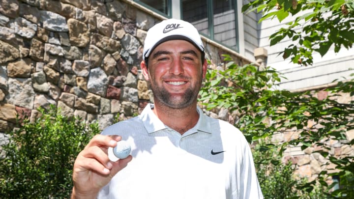 NORTON, MASSACHUSETTS – AUGUST 21: Scottie Scheffler of the United States holds up his golf ball in celebration after scoring a 59 during the second round of The Northern Trust at TPC Boston on August 21, 2020 in Norton, Massachusetts. (Photo by Rob Carr/Getty Images)