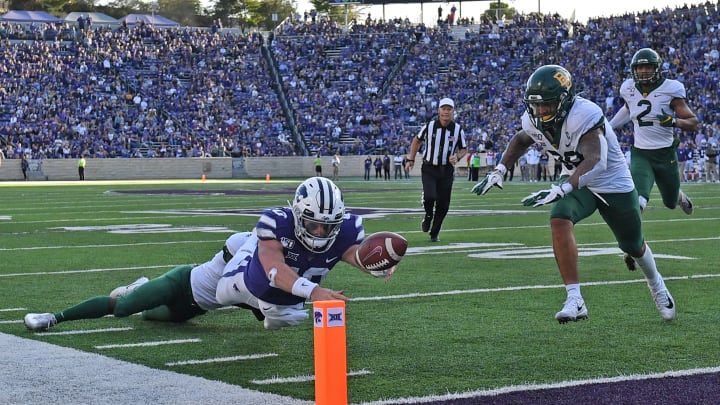 MANHATTAN, KS - OCTOBER 05: Quarterback Skylar Thompson #10 of the Kansas State Wildcats makes a diving attempt for the goal line on a two conversion try, against the Baylor Bears during the second half at Bill Snyder Family Football Stadium on October 5, 2019 in Manhattan, Kansas. (Photo by Peter G. Aiken/Getty Images)