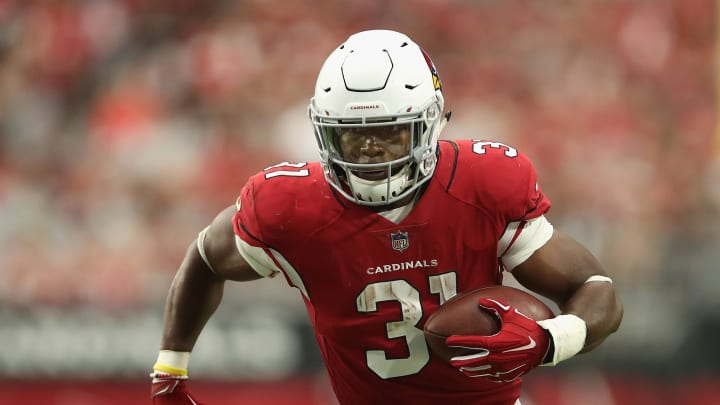 GLENDALE, AZ – SEPTEMBER 09: Running back David Johnson #31 of the Arizona Cardinals rushes the football against the Washington Redskins during the NFL game at State Farm Stadium on September 9, 2018 in Glendale, Arizona. The Redskins defeated the Cardinals 24-6. (Photo by Christian Petersen/Getty Images)