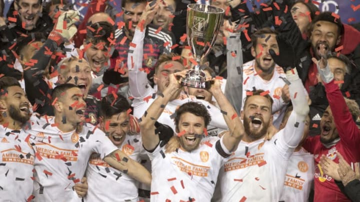 HARRISON, NEW JERSEY- November 29: Michael Parkhurst #3 of Atlanta United holds the Eastern Conference Trophy aloft as he celebrates with team mates including, Miguel Almiron #10 of Atlanta United, Leandro Gonzalez #5 of Atlanta United, Josef Martinez #7 of Atlanta United, Eric Remedi #11 of Atlanta United, Brad Guzan #1 of Atlanta United during the New York Red Bulls Vs Atlanta United FC MLS Eastern Conference Final second leg at Red Bull Arena on November 29th, 2018 in Harrison, New Jersey. (Photo by Tim Clayton/Corbis via Getty Images)
