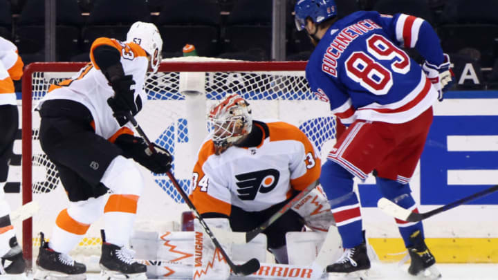 Apr 23, 2021; New York, New York, USA; Pavel Buchnevich #89 of the New York Rangers scores a first period goal against Alex Lyon #34 of the Philadelphia Flyers at Madison Square Garden. Mandatory Credit: Bruce Bennett/POOL PHOTOS-USA TODAY Sports