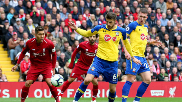 LIVERPOOL, ENGLAND - SEPTEMBER 22: Wesley Hoedt of Southampton scores an own goal for Liverpool's first goal during the Premier League match between Liverpool FC and Southampton FC at Anfield on September 22, 2018 in Liverpool, United Kingdom. (Photo by Alex Livesey/Getty Images)