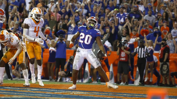 Sep 25, 2021; Gainesville, Florida, USA;Florida Gators running back Malik Davis (20) runs the ball in for a touchdown against the Tennessee Volunteers during the fourth quarter at Ben Hill Griffin Stadium. Mandatory Credit: Kim Klement-USA TODAY Sports