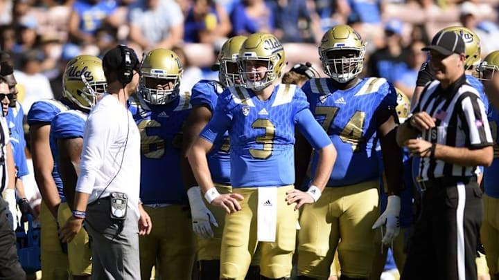 Oct 31, 2015; Pasadena, CA, USA; UCLA Bruins quarterback Josh Rosen (center) waits on the sideline during the third quarter against the Colorado Buffaloes at Rose Bowl. The UCLA Bruins won 35-31. Mandatory Credit: Kelvin Kuo-USA TODAY Sports