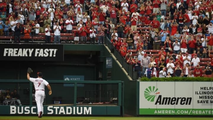 Oct 2, 2016; St. Louis, MO, USA; St. Louis Cardinals left fielder Matt Holliday (7) receives a standing ovation as he enters the game during the ninth inning against the Pittsburgh Pirates at Busch Stadium. The Cardinals won 10-4. Mandatory Credit: Jeff Curry-USA TODAY Sports