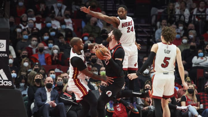Miami Heat forward Haywood Highsmith (24) is called for a foul during the first half against Portland Trail Blazers center Jusuf Nurkic(Troy Wayrynen-USA TODAY Sports)