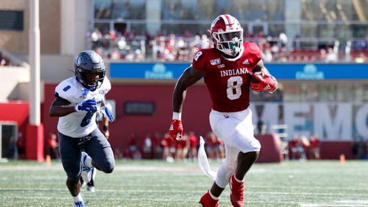 BLOOMINGTON, INDIANA - SEPTEMBER 07: Stevie Scott III #8 of the Indiana Hoosiers runs the ball while being chased by Antonio Crosby #8 of the Eastern Illinois Panthers during the first quarter in the game at Memorial Stadium on September 07, 2019 in Bloomington, Indiana. (Photo by Justin Casterline/Getty Images)