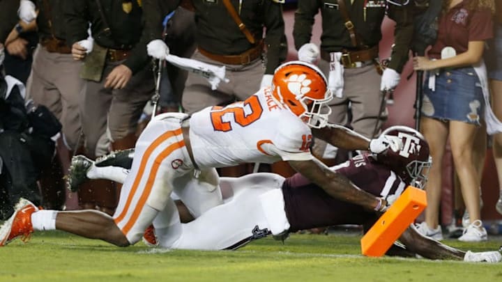 COLLEGE STATION, TX - SEPTEMBER 08: Quartney Davis #1 of the Texas A&M Aggies dives for the endzone as K'Von Wallace #12 of the Clemson Tigers forces him out of bounds after knocking the ball into the endzone for a touchback at Kyle Field on September 8, 2018 in College Station, Texas. The play was reviewed and confirmed a touchback. (Photo by Bob Levey/Getty Images)