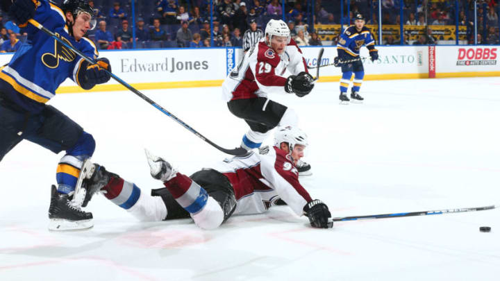 ST. LOUIS, MO - NOVEMBER 6: Dmitrij Jaskin #23 and Gabriel Landeskog #92 of the Colorado Avalanche look to gain control of the puck in the third period at the Scottrade Center on November 6, 2016 in St. Louis, Missouri. (Photo by Dilip Vishwanat/NHLI via Getty Images)