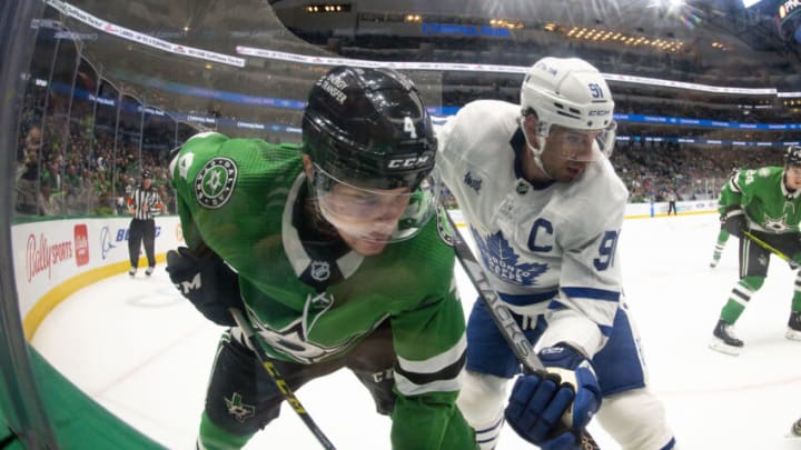 Dec 6, 2022; Dallas, Texas, USA; Dallas Stars defenseman Miro Heiskanen (4) and Toronto Maple Leafs center John Tavares (91) in action during the game between the Dallas Stars and the Toronto Maple Leafs at American Airlines Center. Mandatory Credit: Jerome Miron-USA TODAY Sports