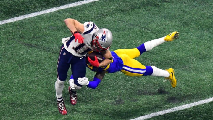 ATLANTA, GEORGIA - FEBRUARY 03: John Johnson #43 of the Los Angeles Rams attempts to tackle Julian Edelman #11 of the New England Patriots in the second half during Super Bowl LIII at Mercedes-Benz Stadium on February 03, 2019 in Atlanta, Georgia. (Photo by Scott Cunningham/Getty Images)