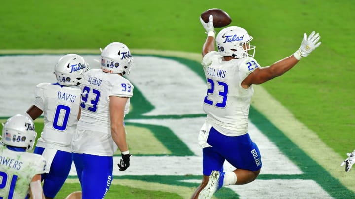 TAMPA, FLORIDA – OCTOBER 23: Zaven Collins #23 of the Tulsa Golden Hurricane celebrates after intercepting a pass thrown by Noah Johnson #0 of the South Florida Bulls and scoring during the second half at Raymond James Stadium on October 23, 2020 in Tampa, Florida. (Photo by Julio Aguilar/Getty Images)
