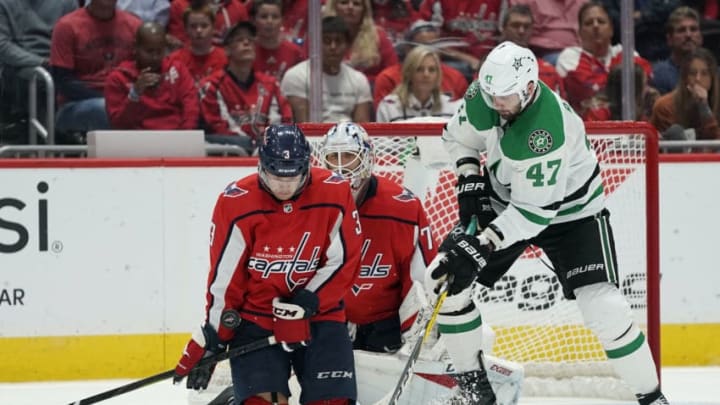 WASHINGTON, DC - OCTOBER 08: Nick Jensen #3 of the Washington Capitals blocks a shot in front of Braden Holtby #70 in the third period against the Dallas Stars at Capital One Arena on October 8, 2019 in Washington, DC. (Photo by Patrick McDermott/NHLI via Getty Images)